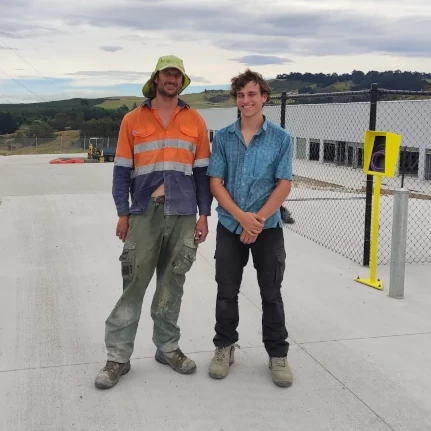 Marcus with his son Harris during construction